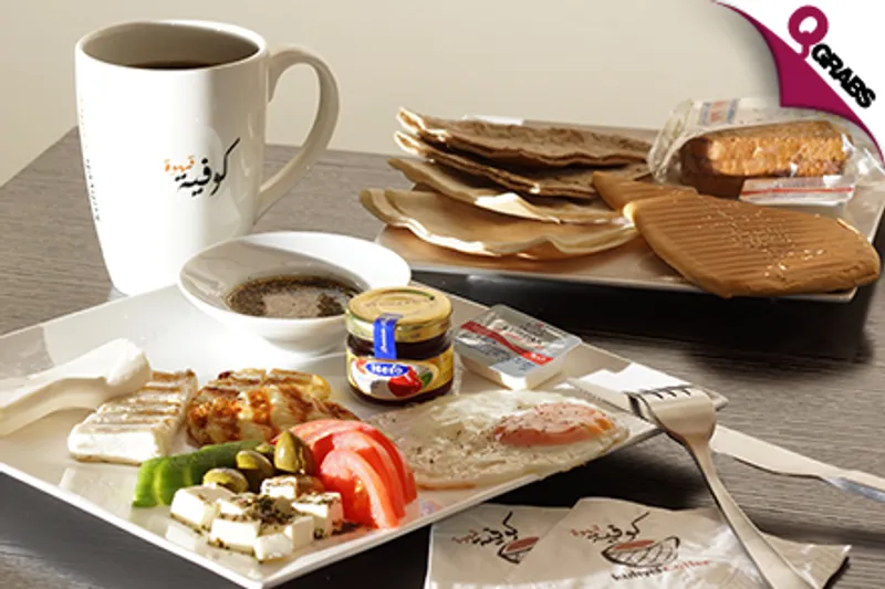 For QR25 Enjoy Your Choice of Beverages like Coffee & Smoothies with Some Delicious Food! (QR50 Value)